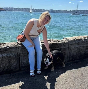 Hayley pet sitting with a happy dog in Sydney.